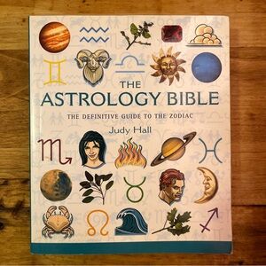 The Astrology Bible: The Definitive Guide to the Zodiac Book by Judy Hall